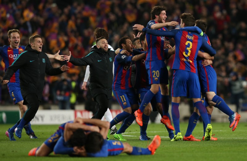 barcelona players celebrate after the game completing a historic comeback against psg on march 8 2017 photo reuters