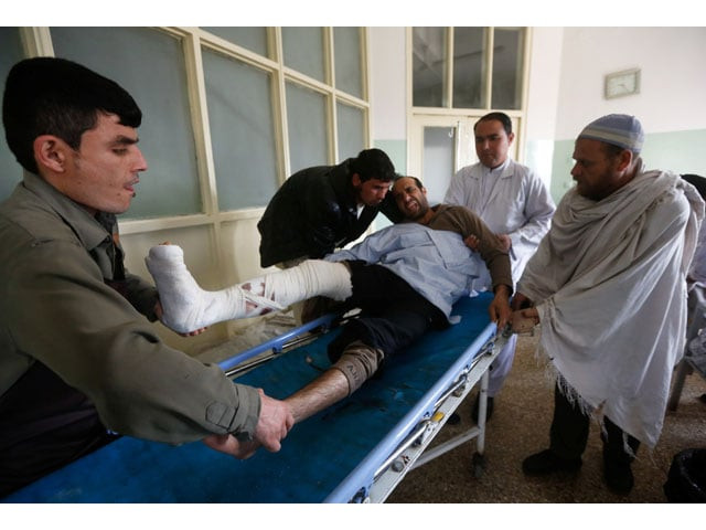 men carry an injured man inside a hospital a day after a bomb blast and gun fire at a military hospital in kabul afghanistan on march 9 2017 photo reuters men carry an injured man inside a hospital a day after a bomb blast and gun fire at a military hospital in kabul afghanistan on march 9 2017 photo reuters