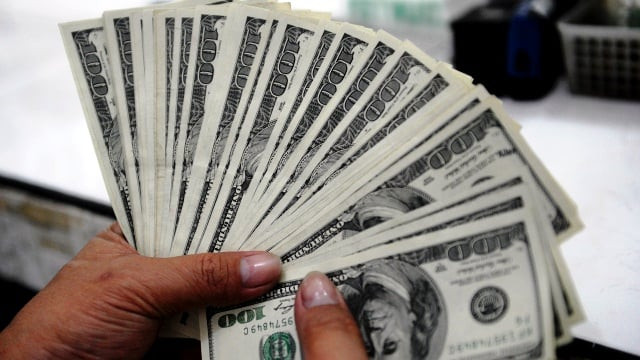 an employee at a money changer counts usd 100 bills in manila on october 25 2012 photo noel celis afp getty images an employee at a money changer counts usd 100 bills in manila on october 25 2012 photo noel celis afp getty images