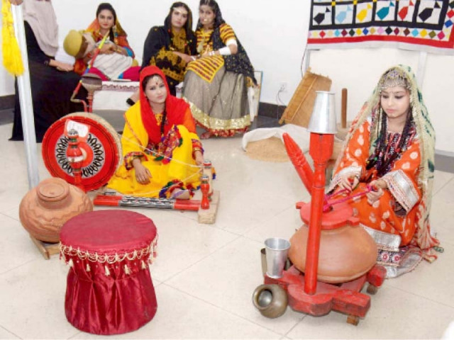 uaf students present a folk scene at the expo photo express
