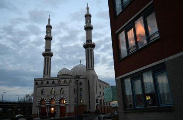 geert wilders has vowed to bar muslim immigrants close mosques and ban sales of the quran photo afp