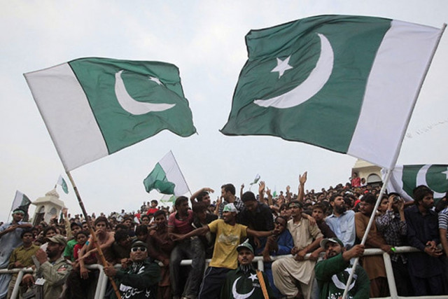 crowd waving pakistan 039 s flag photo reuters crowd waving pakistan 039 s flag photo reuters