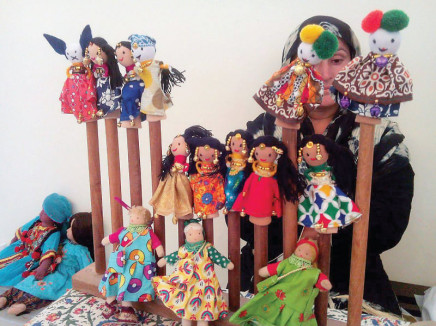 puppets dolls and various types of toys were on display photo express