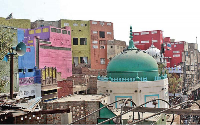 buildings in the old city area have been painted over under the project funded by italy photo app