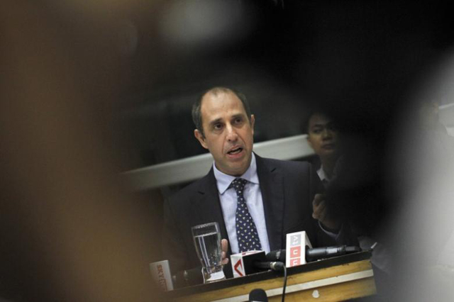 tomas ojea quintana c u n special envoy on human rights in myanmar reads his statement at a news conference in yangon international airport february 19 2014 photo reuters