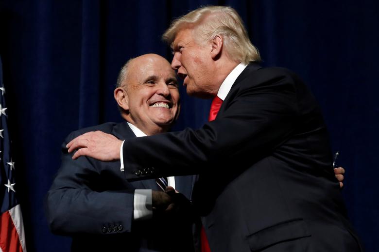 us president donald trump r with close aide rudy w giuliani l photo reuters