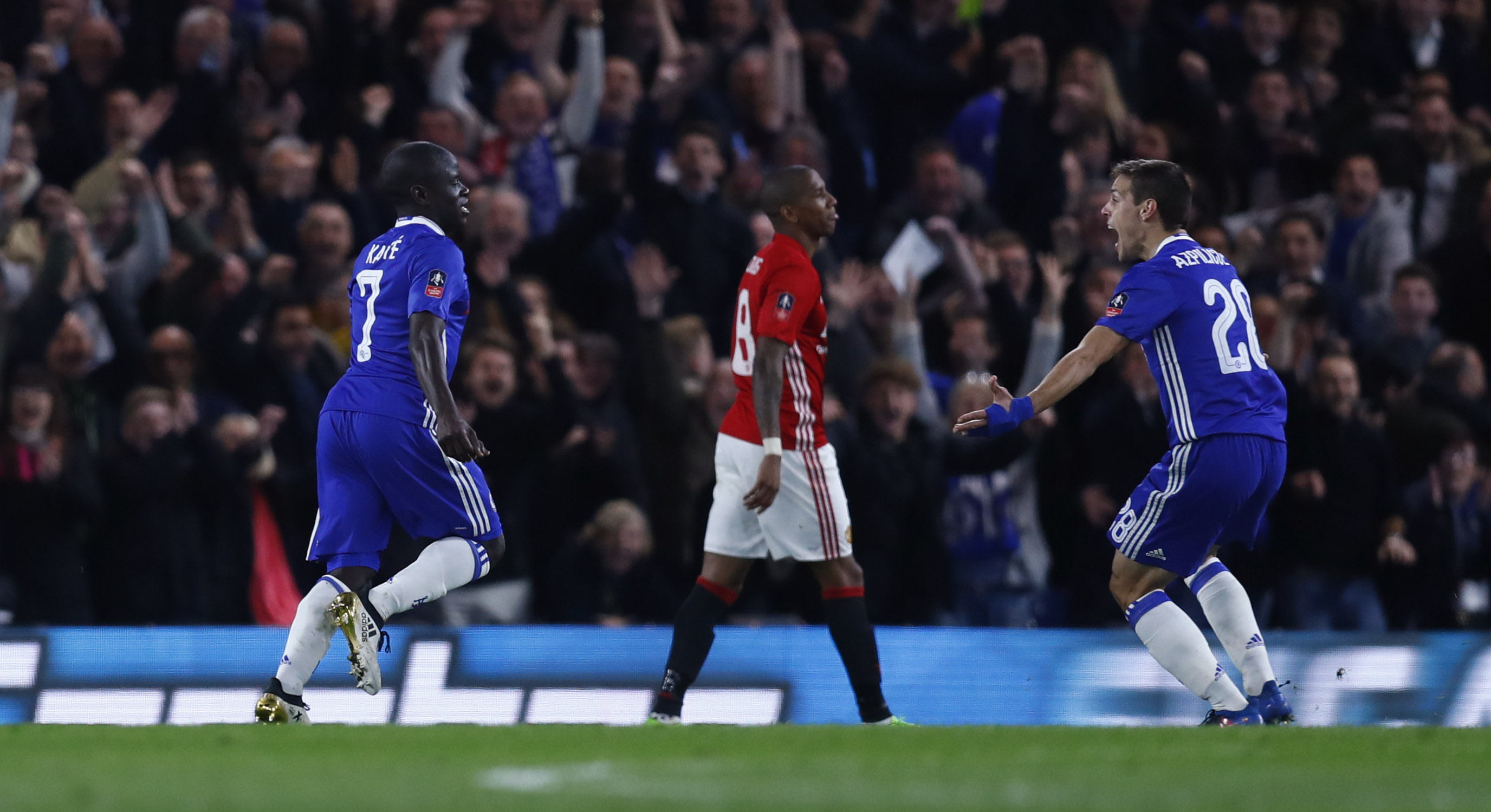 chelsea 039 s n 039 golo kante l celebrates scoring their first goal with cesar azpilicueta r against manchester united on march 13 2017 photo reuters