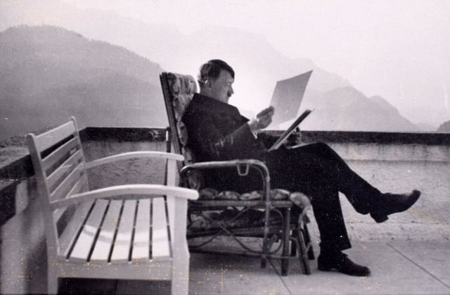 adolf hitler is shown in pensive thought as he sits alone on the veranda at the berghof studying some papers during wwii photo c amp t auctions adolf hitler is shown in pensive thought as he sits alone on the veranda at the berghof studying some papers during wwii photo c amp t auctions