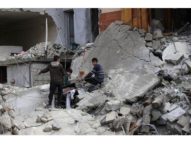 boys stand amidst rubble of damaged buildings in the northern syrian city of al bab syria march 13 2017 photo reuters boys stand amidst rubble of damaged buildings in the northern syrian city of al bab syria march 13 2017 photo reuters