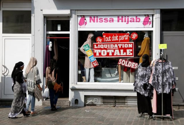 women enter a store selling hijabs in the brussels district of molenbeek belgium august 14 2016 photo reuters women enter a store selling hijabs in the brussels district of molenbeek belgium august 14 2016 photo reuters