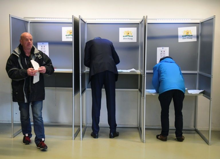 polling booths set up in schools town halls as well as shops bowling alleys and swimming pools will close at 2000 gmt with exit polls expected shortly after photo afp