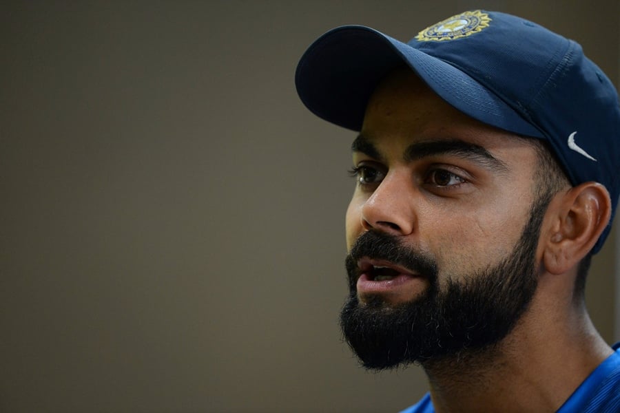 indian cricket team captain virat kohli attends a press conference ahead of their third test cricket match against australia at the jharkhand state cricket association jsca stadium complex in ranchi on march 15 2017 photo afp