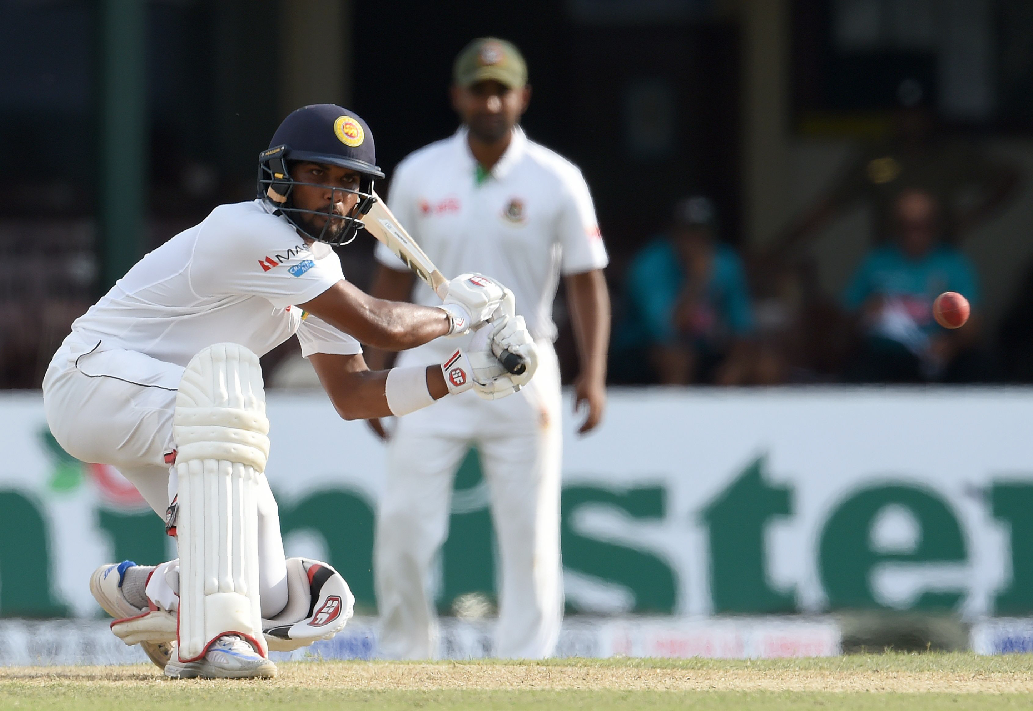 lifeline chandimal who faced 210 balls and hit four fours in his knock was given out lbw on 38 off the bowling of left arm spinner shakibal hasan but the decision was overturned following a review photo