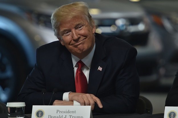 us president donald trump speaks with auto executives at american center for mobility in ypsilanti michigan on march 15 2017 photo afp