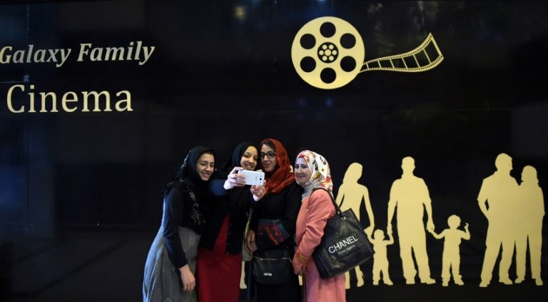 kabul 039 s new family friendly cinema is one of the few places where women usually confined to the home can spend time in public with their husbands and children photo afp