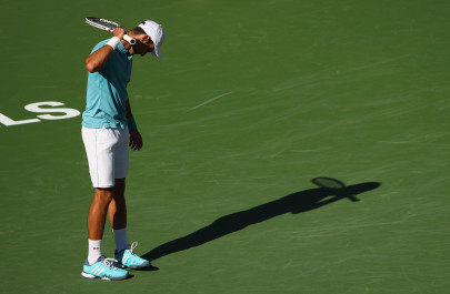djokovic nadal ousted but federer advances