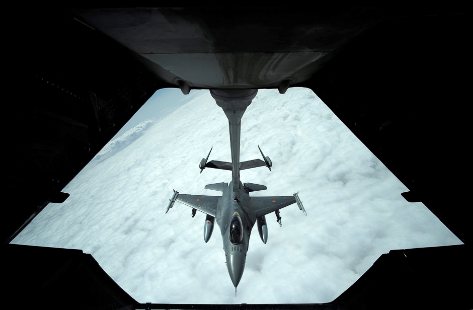 a us air force f 16 receives fuel from a fuel boom suspended from a us air force kc 10 extender during mid air refueling support to operation inherent resolve over iraq and syria air space photo reuters