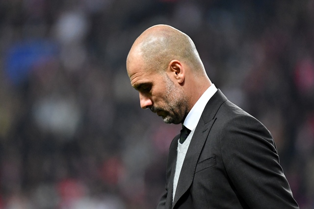 manchester city 039 s spanish manager pep guardiola reacts during the uefa champions league round of 16 football match between monaco and manchester city at the stade louis ii in monaco on march 15 2017 photo afp