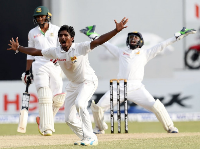 late charge sri lanka towards the end of day two bagged three quick wickets to put bangladesh on the back foot photo afp late charge sri lanka towards the end of day two bagged three quick wickets to put bangladesh on the back foot photo afp