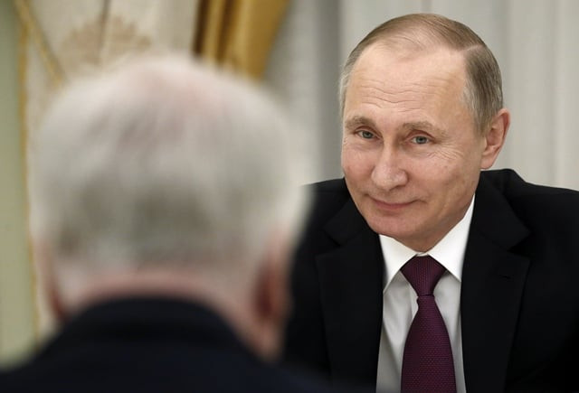 russian president vladimir putin attends a meeting at the kremlin in moscow on march 16 photo afp russian president vladimir putin attends a meeting at the kremlin in moscow on march 16 photo afp