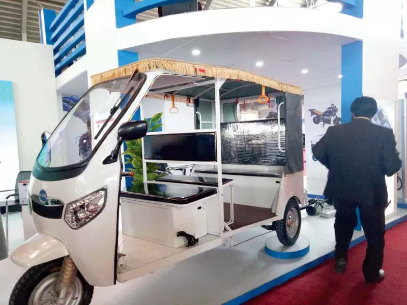 an electronic solar powered rickshaw rick e is on display photo express an electronic solar powered rickshaw rick e is on display photo express