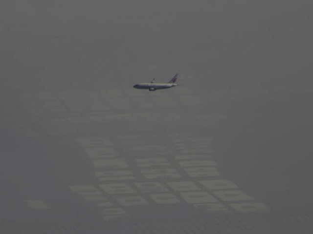 an air china passenger aircraft flies amid heavy smog over the suburb of beijing china january 2 2017 photo reuters an air china passenger aircraft flies amid heavy smog over the suburb of beijing china january 2 2017 photo reuters
