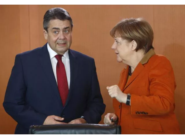 german chancellor angela merkel and foreign minister sigmar gabriel before cabinet meeting at the chancellery in berlin germany march 15 2017 photo reuters german chancellor angela merkel and foreign minister sigmar gabriel before cabinet meeting at the chancellery in berlin germany march 15 2017 photo reuters