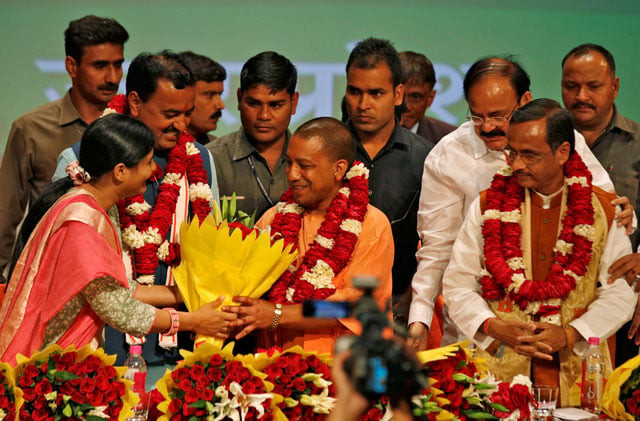 yogi adityanath c is greeted after he was elected as chief minister of india 039 s most populous state of uttar pradesh during the party lawmakers 039 meeting in lucknow india march 18 2017 photo reuters yogi adityanath c is greeted after he was elected as chief minister of india 039 s most populous state of uttar pradesh during the party lawmakers 039 meeting in lucknow india march 18 2017 photo reuters