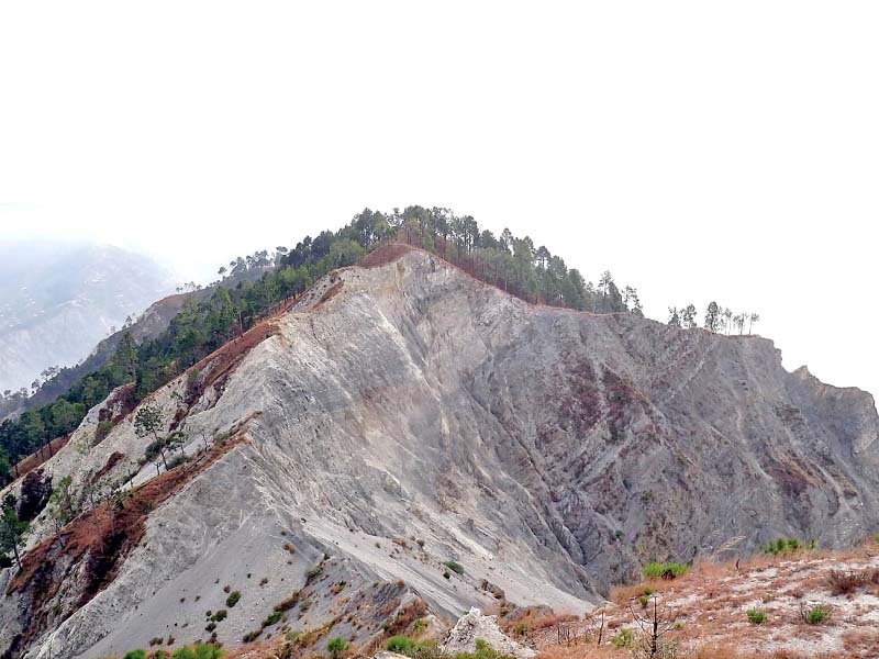 a mountain denuded of trees near muzaffarabad remains prone to landslides photo online