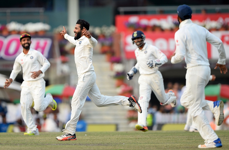 indian bowler ravindra jadeja 2l celebrates with teammates after he dismissed unseen australian batsman nathan lyon during the fourth day of the third test cricket match between india and australia at the jharkhand state cricket association jsca stadium complex in ranchi on march 19 2017 photo afp