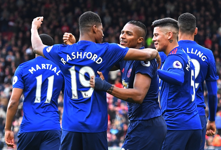 manchester united 039 s antonio valencia celebrates scoring their third goal with teammates photo reuters