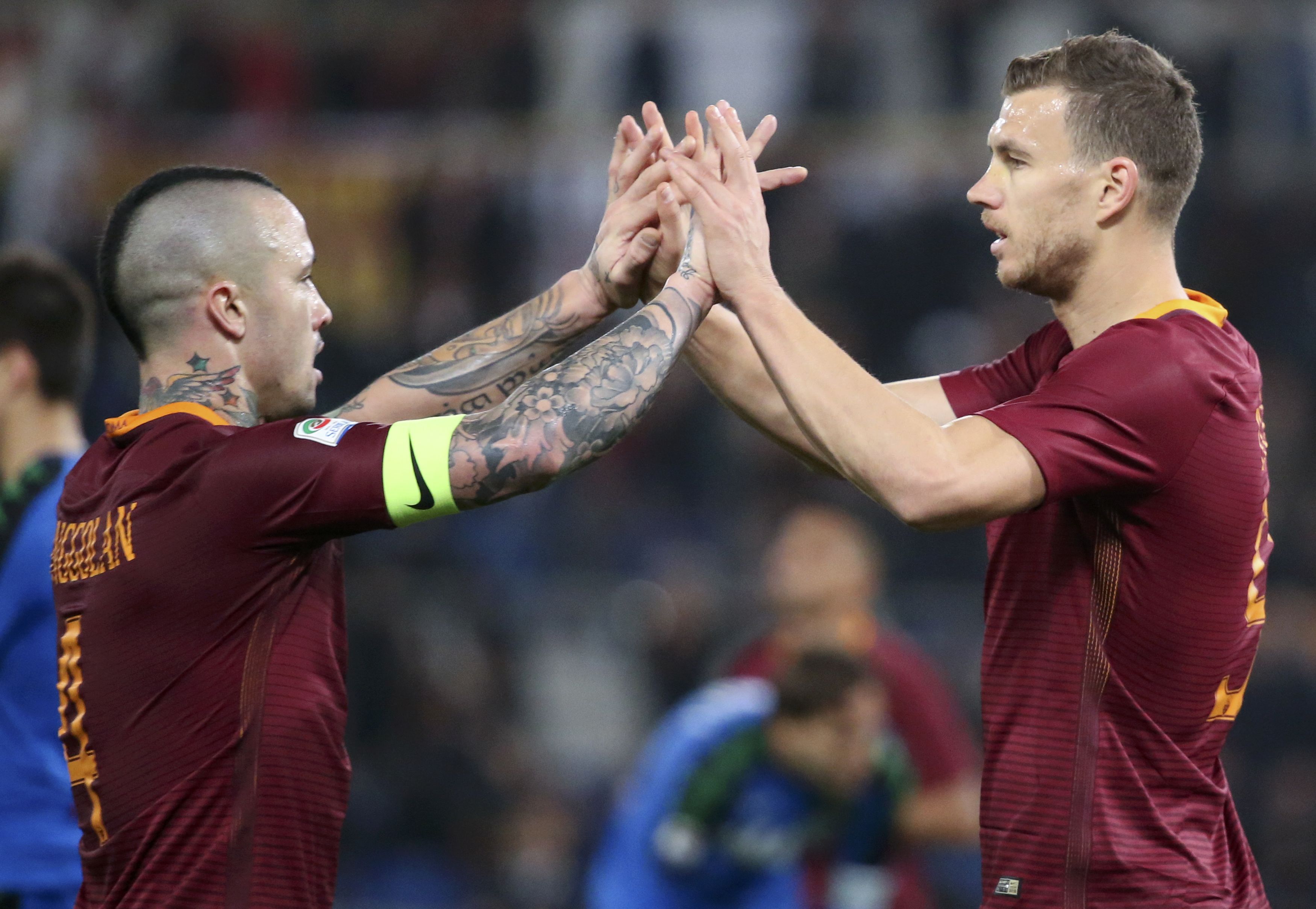 as roma 039 s edin dzeko r celebrates with teammate radja nainggolan l after scoring against sassuolo on march 19 2017 photo reuters