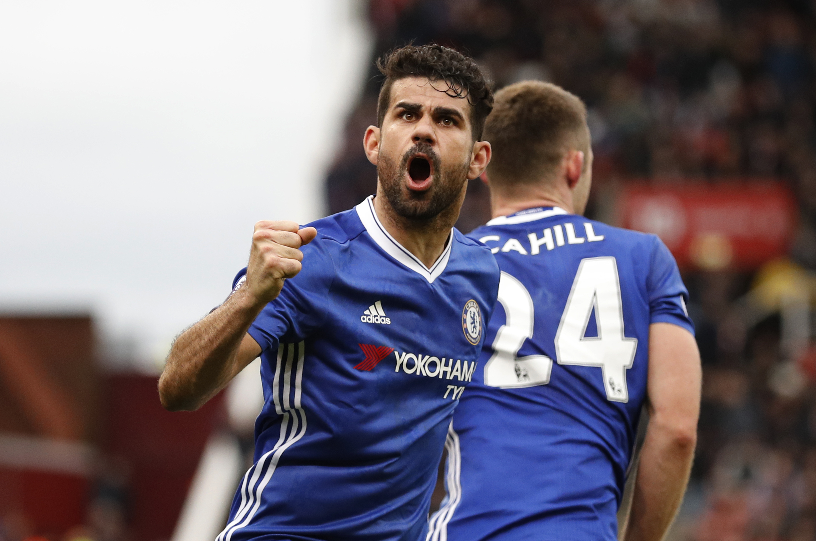 chelsea 039 s gary cahill celebrates with diego costa scoring their second goal against stoke city on march 18 2017 photo reuters