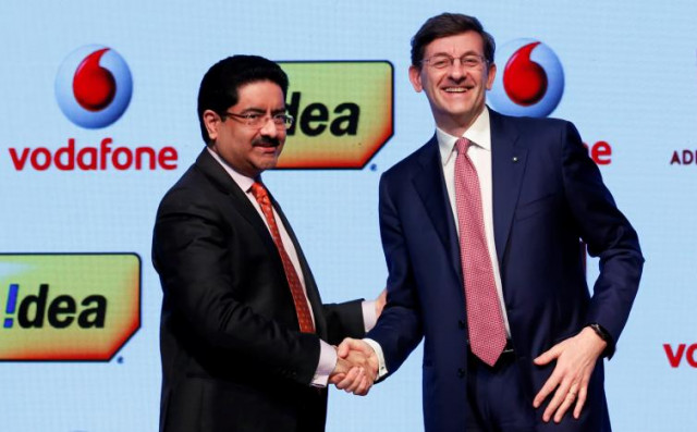 kumar mangalam birla l chairman of aditya birla group shakes hands with vittorio colao ceo of vodafone group after a news conference in mumbai india march 20 2017 photo reuters kumar mangalam birla l chairman of aditya birla group shakes hands with vittorio colao ceo of vodafone group after a news conference in mumbai india march 20 2017 photo reuters