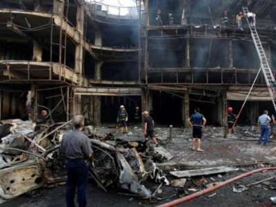 baghdad car bomb kills at least 15 ministry official