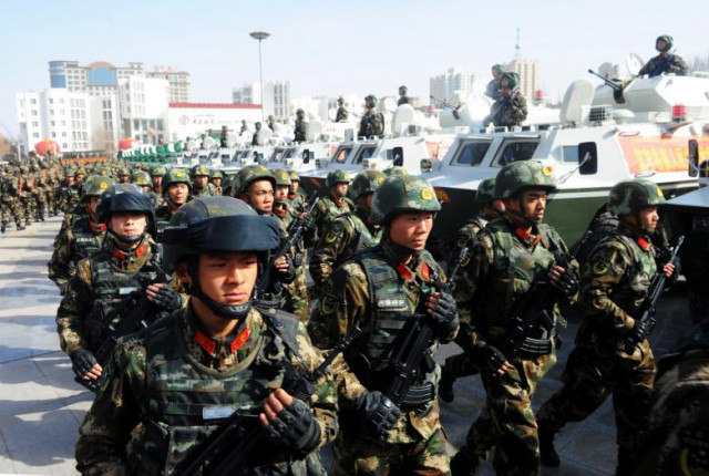 paramilitary policemen stand in formation as they take part in an anti terrorism oath taking rally in kashgar xinjiang uighur autonomous region china february 27 2017 reuters stringer paramilitary policemen stand in formation as they take part in an anti terrorism oath taking rally in kashgar xinjiang uighur autonomous region china february 27 2017 reuters stringer