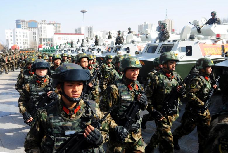 paramilitary policemen stand in formation as they take part in an anti terrorism oath taking rally in kashgar xinjiang uighur autonomous region china february 27 2017 reuters stringer