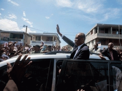 shots fired at convoy of haiti ex president aristide lawyer