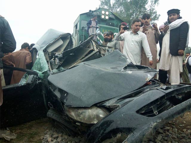 two police officials killed as train rams into their vehicle