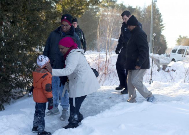 a family who claimed to be from sudan are met by royal canadian mounted police rcmp officers as they illegally cross the us canada border leading into hemmingford quebec canada march 20 2017 photo reuters a family who claimed to be from sudan are met by royal canadian mounted police rcmp officers as they illegally cross the us canada border leading into hemmingford quebec canada march 20 2017 photo reuters