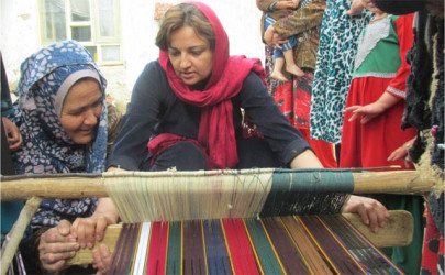 afghan activist who adopted 16 children wins award for work on job creation women