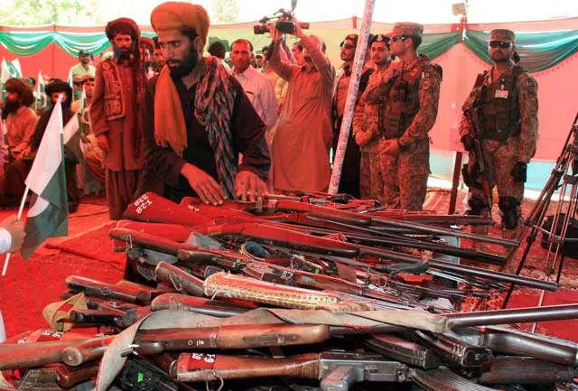 the fighters surrendered their weapons during an independence day ceremony at police lines in quetta photo inp the fighters surrendered their weapons during an independence day ceremony at police lines in quetta photo inp
