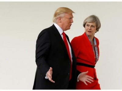 trump was being a gentleman may says on holding hands