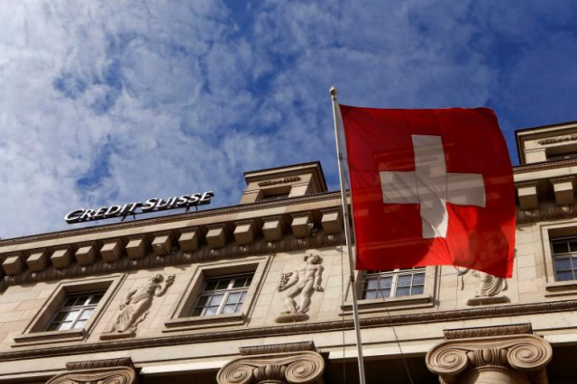 a national flag of switzerland flies in front of a branch office of swiss bank credit suisse in luzern october 30 2014 photo reuters a national flag of switzerland flies in front of a branch office of swiss bank credit suisse in luzern october 30 2014 photo reuters