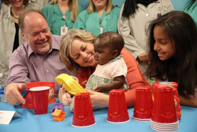 host family members nancy swabb her husband tim swabb and their daughter mara swabb 9 play with 039 baby dominique 039 during a news conference where doctors and staff discuss the outcome of a complex surgical procedure to treat the 10 month old who was born with four legs and two spines at advocate children 039 s hospital in park ridge illinois us march 21 2017 photo reuters host family members nancy swabb her husband tim swabb and their daughter mara swabb 9 play with 039 baby dominique 039 during a news conference where doctors and staff discuss the outcome of a complex surgical procedure to treat the 10 month old who was born with four legs and two spines at advocate children 039 s hospital in park ridge illinois us march 21 2017 photo reuters