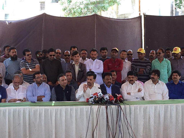 psp chief mustafa kamal addresses a news conference in karachi on wednesday photo psp