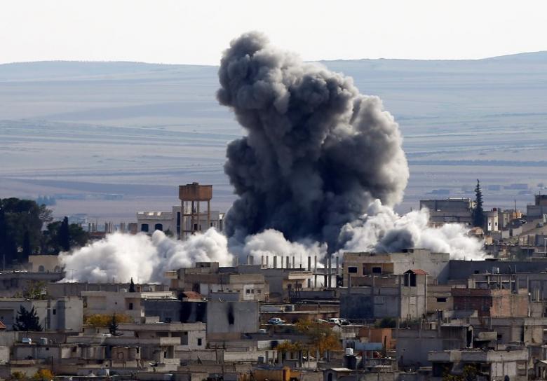 a file photo of an explosion following an air strike is seen in western kobani neighbourhood november 23 2014 photo reuters