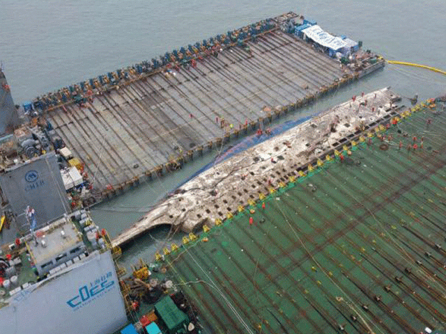 the sunken ferry sewol is raised during its salvage operations on the sea off jindo south korea in this handout picture provided by west regional headquarters korea coast guard and released by yonhap on march 23 2017 photo reuters the sunken ferry sewol is raised during its salvage operations on the sea off jindo south korea in this handout picture provided by west regional headquarters korea coast guard and released by yonhap on march 23 2017 photo reuters