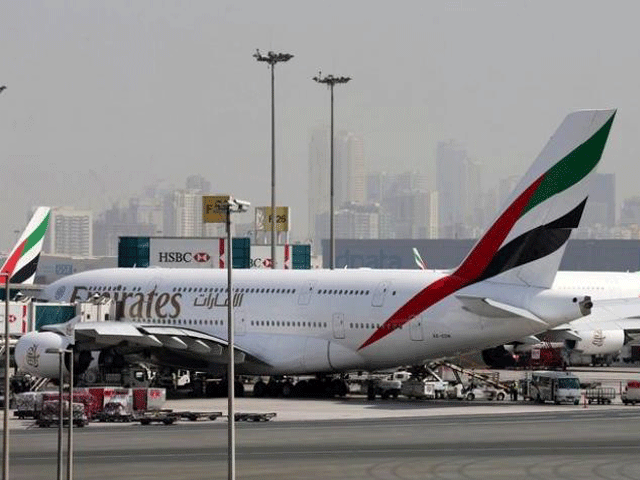 emirates aircraft are seen at dubai international airport united arab emirates may 10 2016 photo reuters