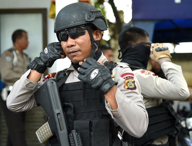 members of the indonesia special police prepare for their security patrol photo afp members of the indonesia special police prepare for their security patrol photo afp